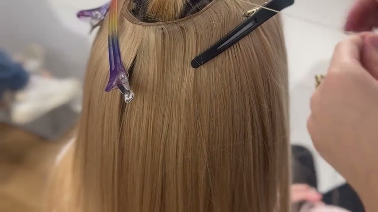 The weft sewn onto a fine braid, with no glue and no heat