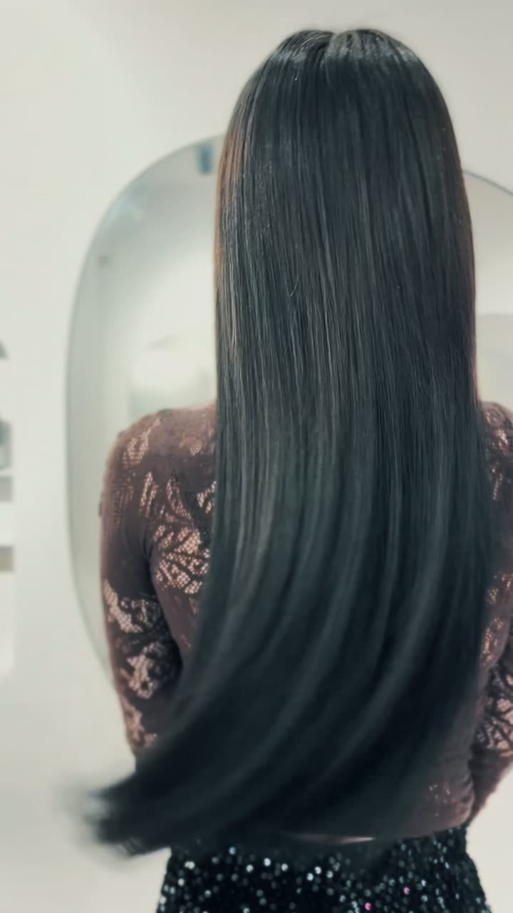 Result of a fitting on brown hair, length down to the waist